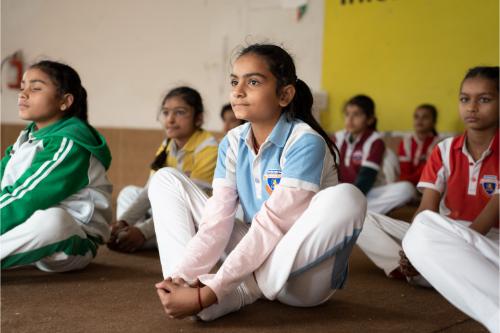 Students doing yoga
